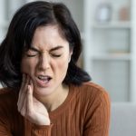 tooth pain emergency sign